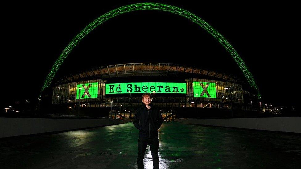 Singer Ed Sheeran poses before announcing his huge headlining show for Friday 10 July 2015 as part of his 'X' world tour at Wembley Stadium