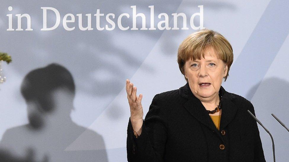 German Chancellor Angela Merkel delivers a speech during a reception to mark the 60th anniversary of migrant workers in Germany in Berlin on December 7, 2015.