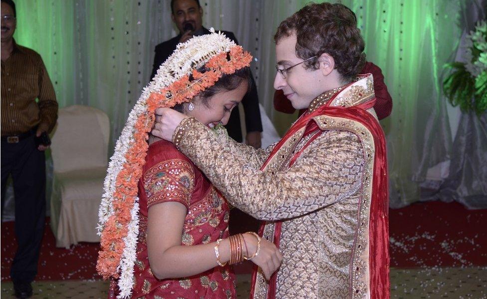 A couple in wedding dress