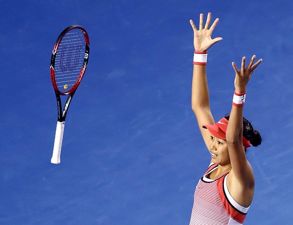 Zhang Shuai of China celebrates after defeating Madison Keys of the United States in their fourth round match at the Australian Open tennis championships in Melbourne, Australia, early Tuesday, 26 January 2016