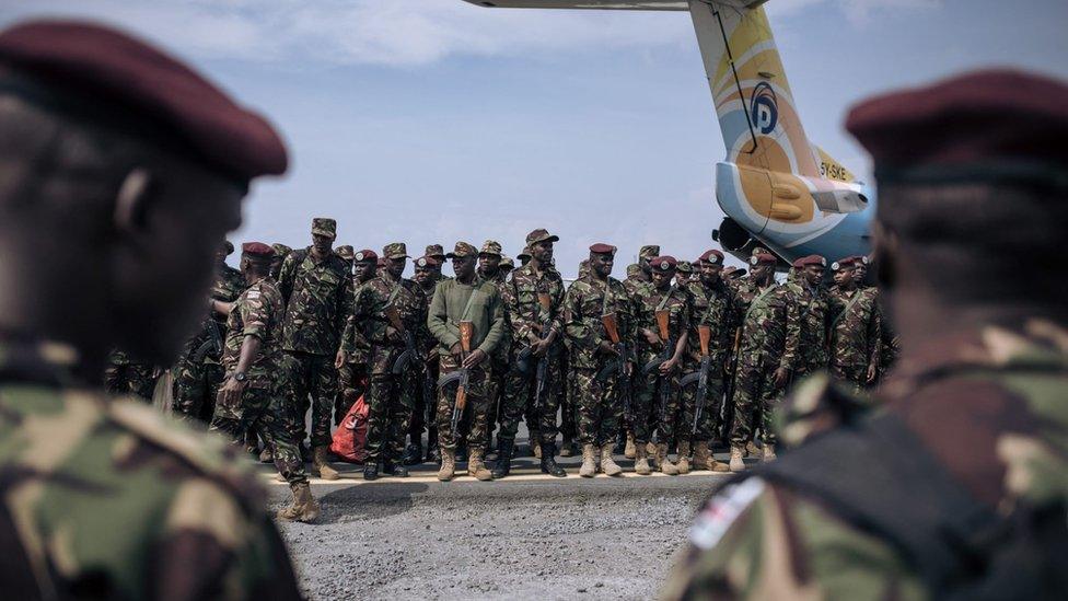 Kenyan soldiers from the East African Community regional force (EAC-RF) prepare to leave the Democratic Republic of Congo, at Goma airport, on December 3, 2023.