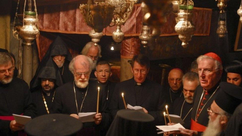 Cardinal Cormac Murphy-O'Connor joined other religious leaders to pray for peace at the Chapel of the Nativity in Bethlehem in 2006