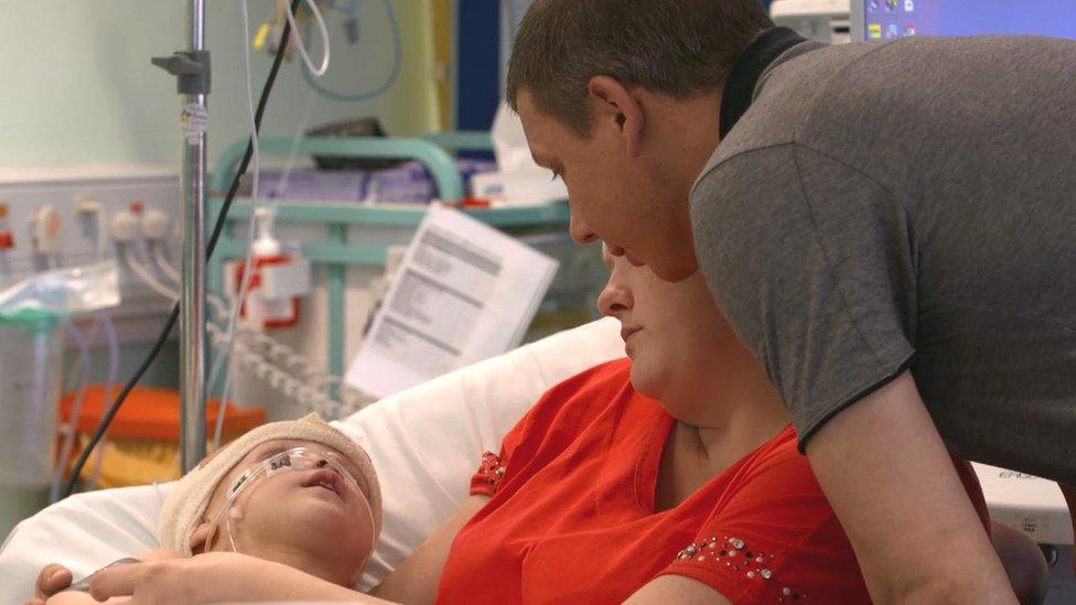 Viktoria with parents Martinas and Patrycja