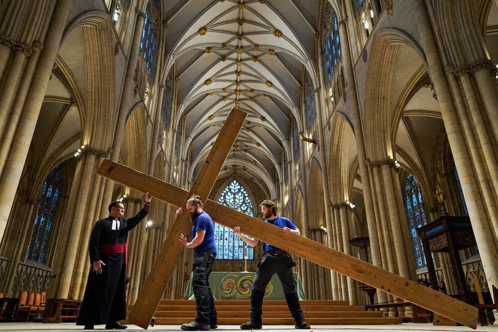 Members of the Minster's Works Department erect the Lent Cross at York Minster, 24 February 2020.