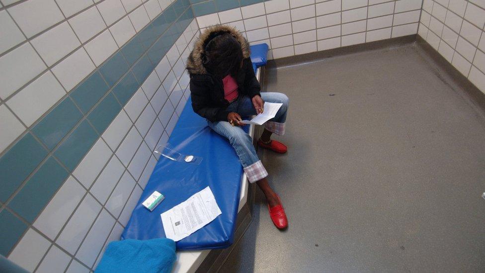 Woman in police cell