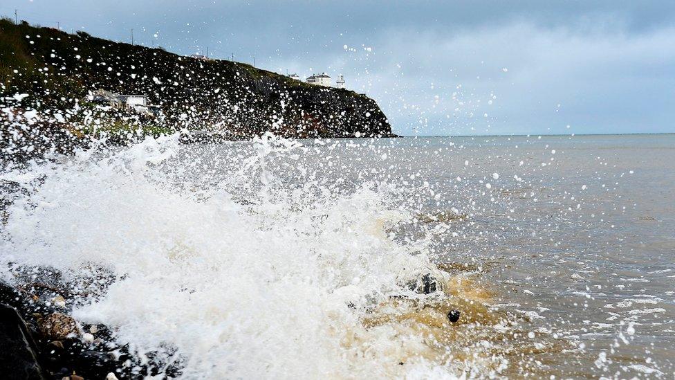 Water splashing against rocks on the north coast of Northern Ireland