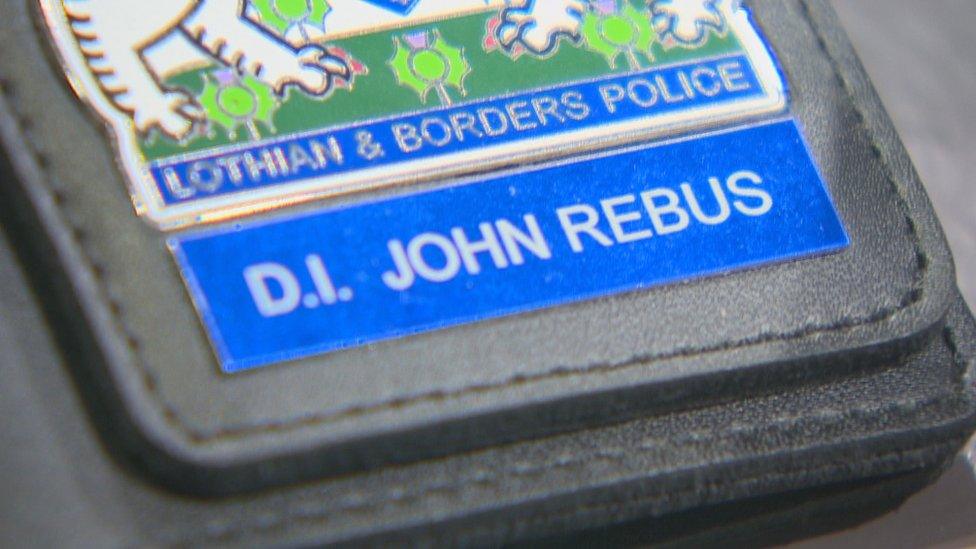 A police badge from the Rebus TV series is also in the exhibition