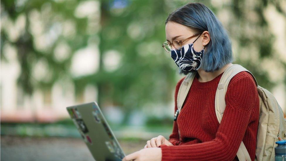 University student wearing mask