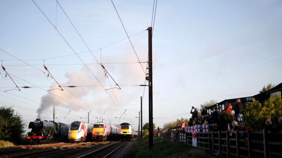 The Flying Scotsman and Virgin Trains' new Azuma travel in the same direction alongside two of the rail operator's present day fleet