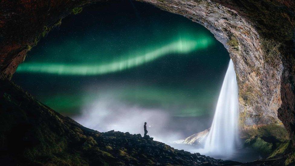 The northern lights and a waterfall.