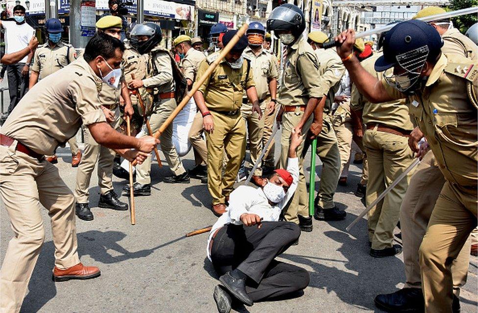 Police in Uttar Pradesh attack an opposition activist protesting against the Hathras rape case