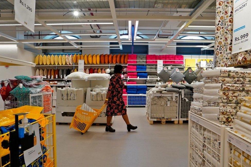 A woman shops inside IKEA"s first city store in Mumbai, India, December 8, 2021.