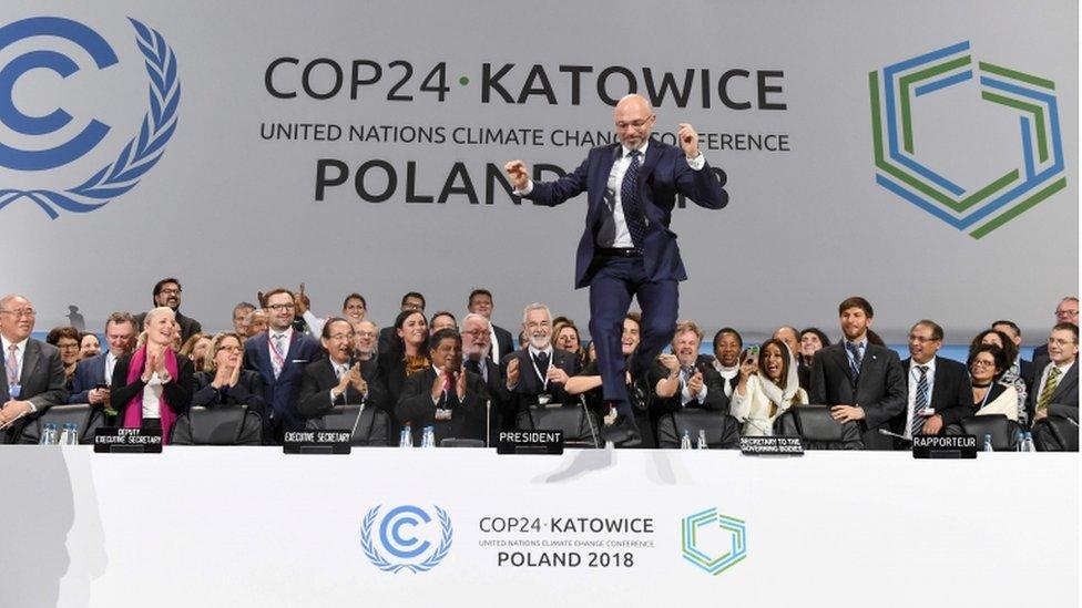 COP24 President Michal Kurtyka celebrates at the end of the COP24 UN Climate Change Conference 2018 in Katowice, Poland