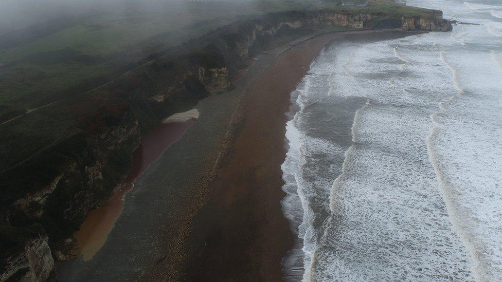 Aerial photo of large waves at Blast Beach on the Durham Coast