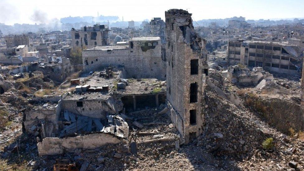 A general view shows damaged buildings in the Qastal al-Harami neighbourhood of Aleppo's Old City on 9 December 2016.