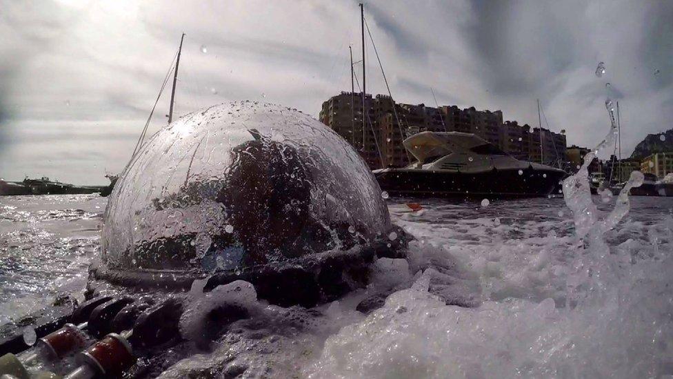 submarine emerging from the sea