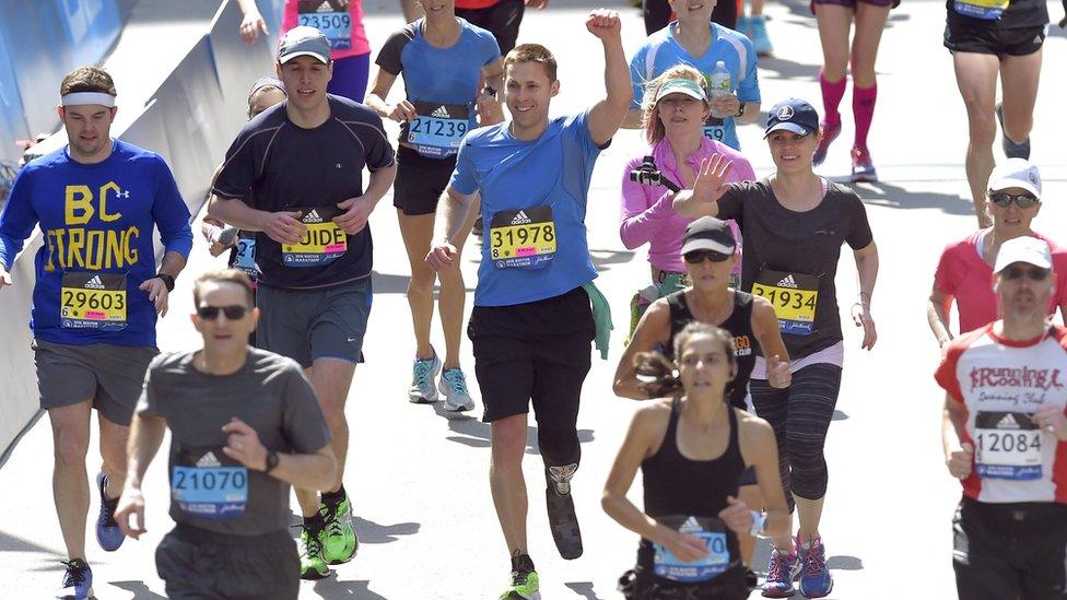 Patrick Downes finishing the Boston marathon