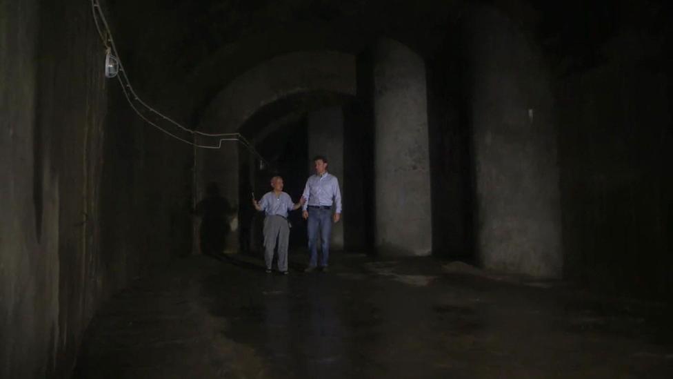 Su and Rupert Wingfield-Hayes in a tunnel