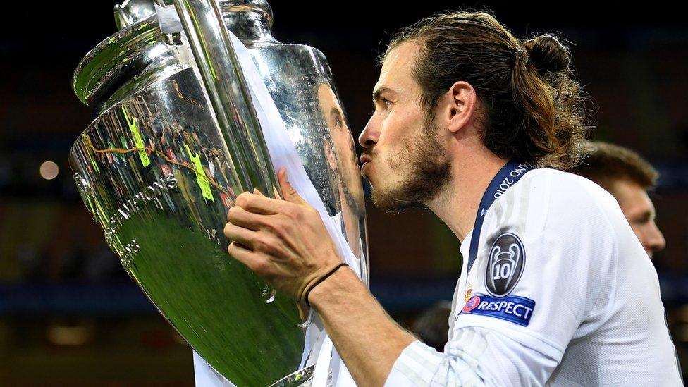 Gareth Bale kisses the Champions League trophy