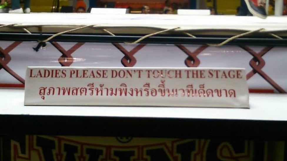 Signage at the new Lumpinee stadium in north Bangkok reads, 'Ladies please don't touch the stage'