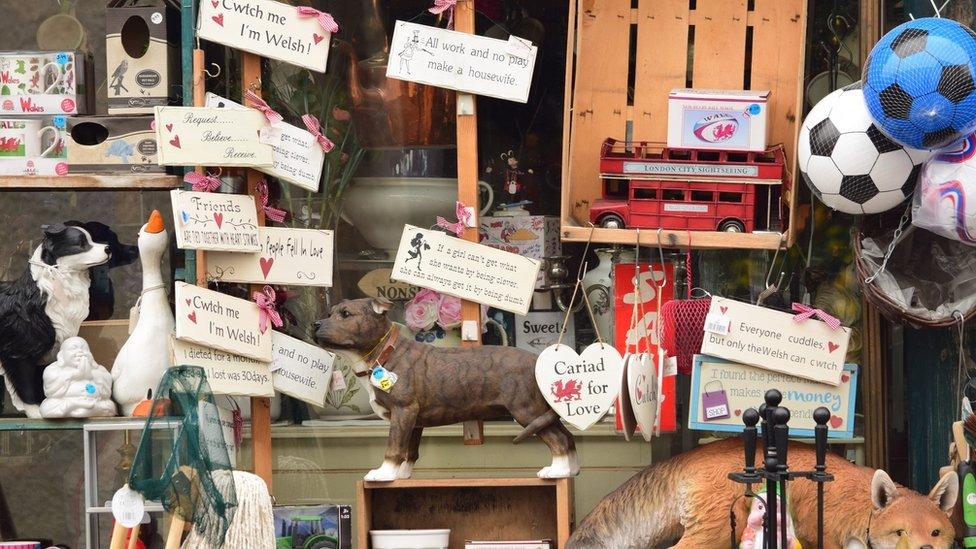 A shop front in Usk with lots of love signs