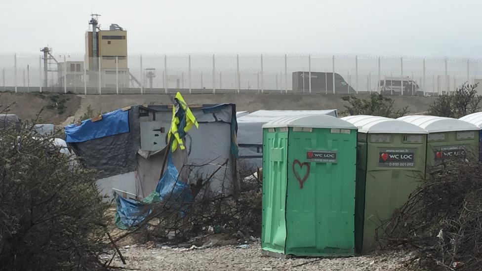 Calais Jungle - makeshift shelters and toilets