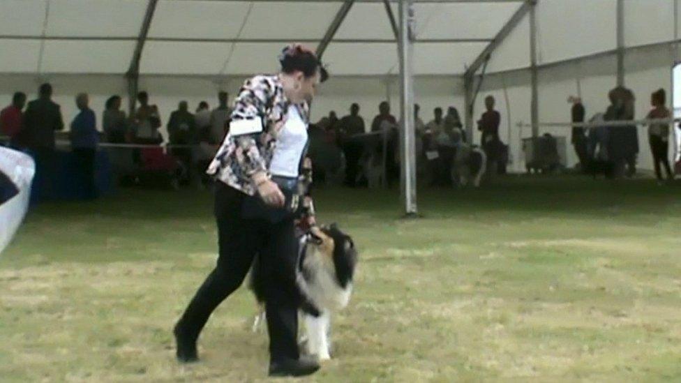 Linda Avery running alongside her dog.