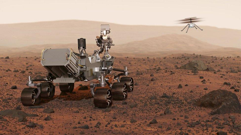 Mars surface with rover and helicopter