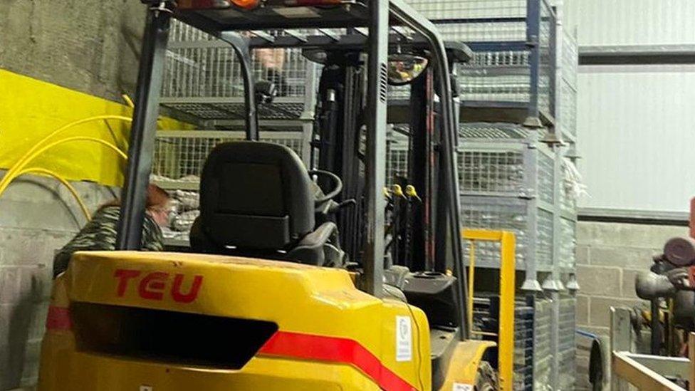 forklift truck blocking sandbags at Derry depot