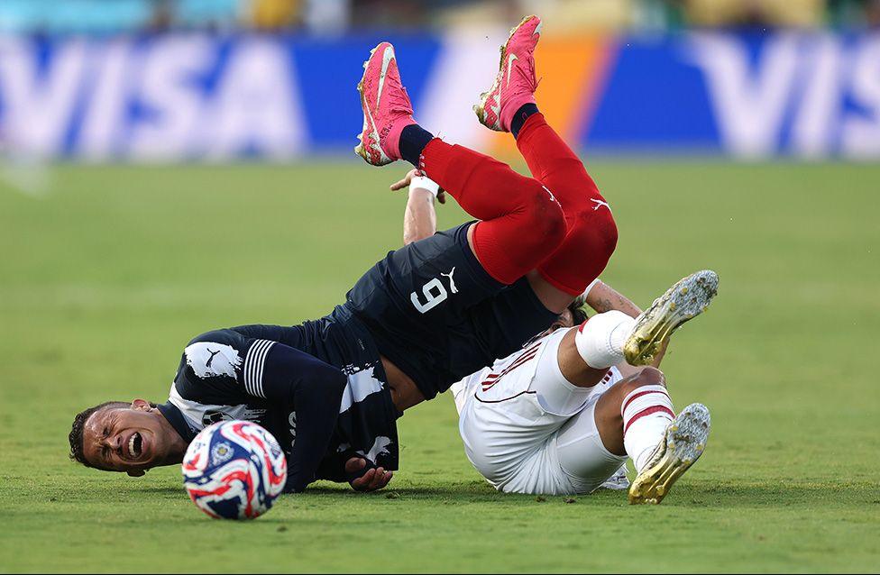 Monterrey player Nelson Deossa is fouled by River Plate's Maximiliano Meza during the FIFA Club World Cup match at the Rose Bowl Stadium in California. Photo by Stu Forster