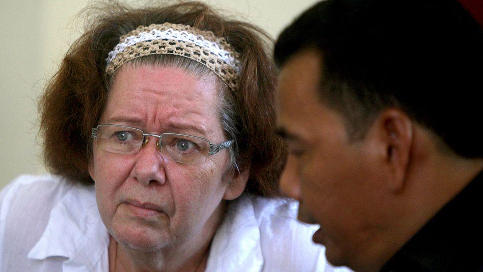 British citizen Lindsay Sandiford, left, listens to her Indonesian lawyer Ersa Karo Karo, right, in a courtroom during her trial in Denpasar, Bali, Indonesia Wednesday, October 31, 2012.