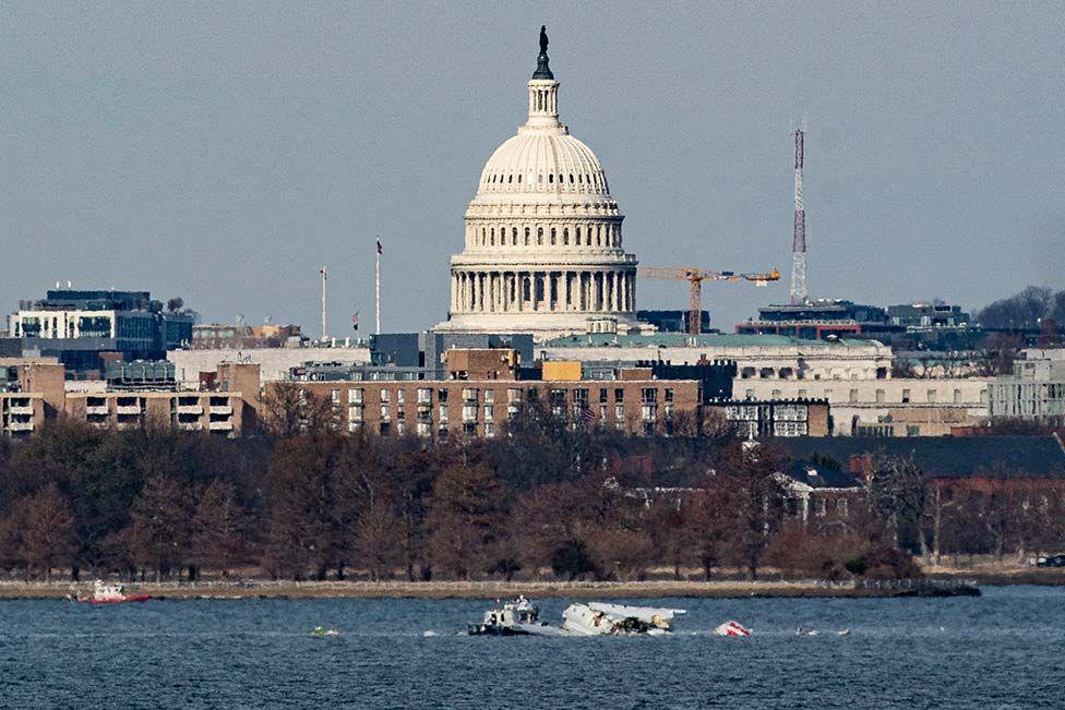 Emergency response units work at the crash site of the American Airlines plane on the Potomac River after the plane crashed last night on approach to Reagan National Airport on January 30, 2025 in Arlington, Virginia. 