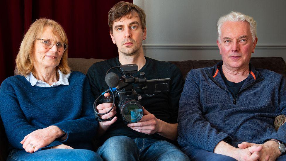 Duncan Cowles with his parents