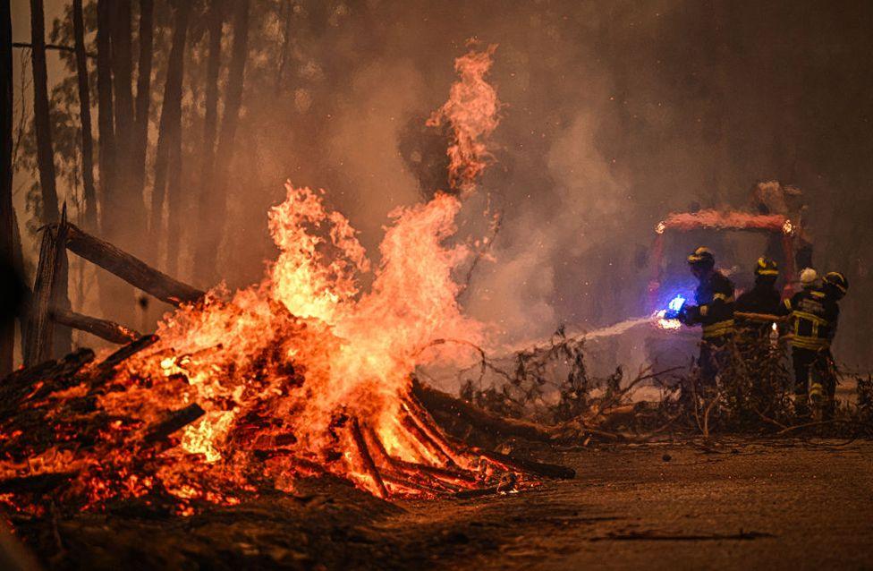 Firefighters combat a wildfire in Espiunca, Arouca, Portugal, on 18 September 2024