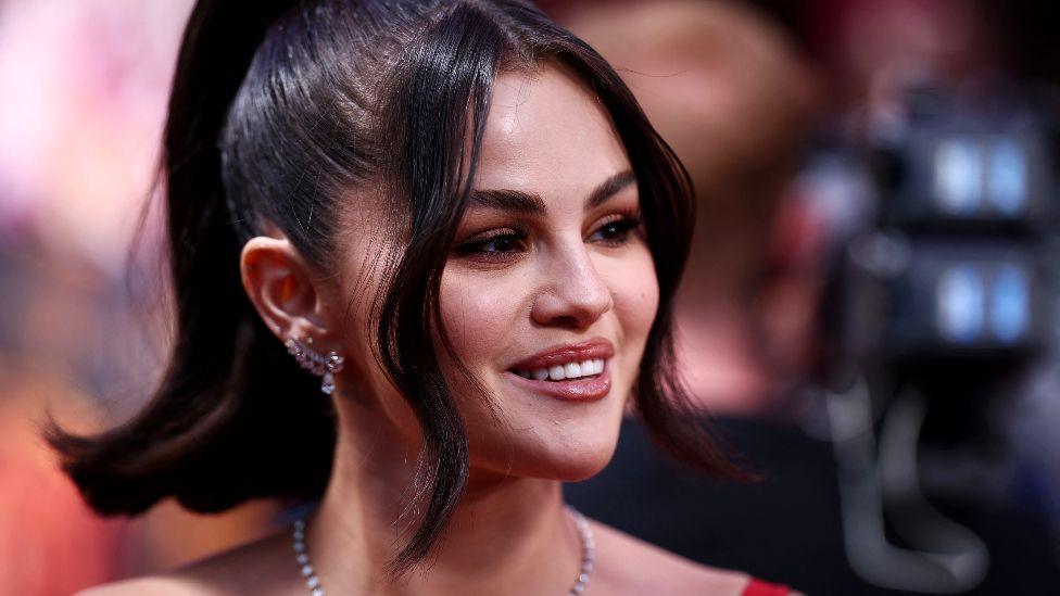 US singer and actor Selena Gomez gives an interview on the red carpet upon arrival to attend the Gala screening of "Emilia Perez" at the Royal Festival Hall, during the 2024 BFI London Film Festival in London, on October 11, 2024