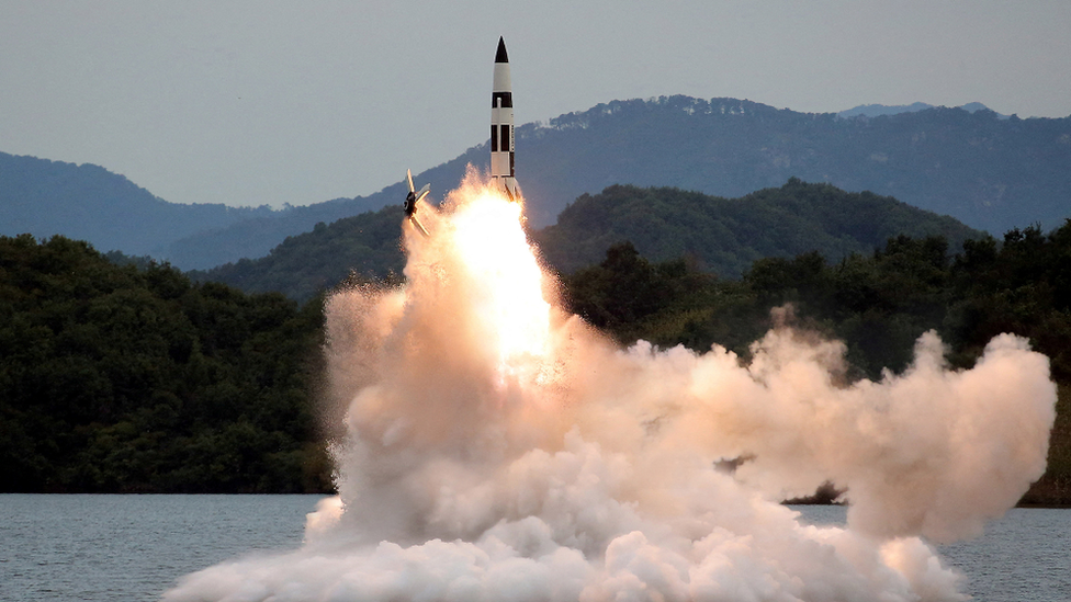 A missile launch in the middle of a lake in North Korea