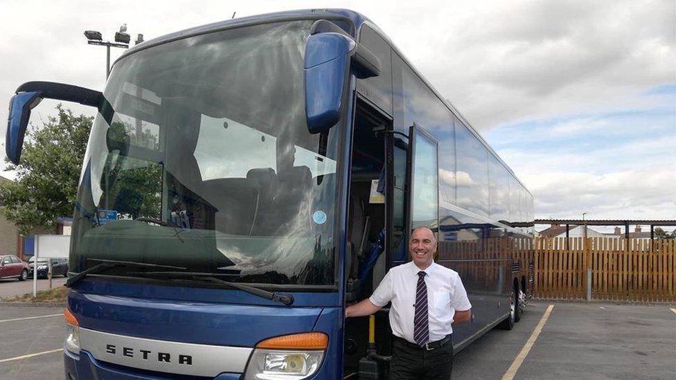 James Clarke, co-owner of Clarkes Travel with his coach