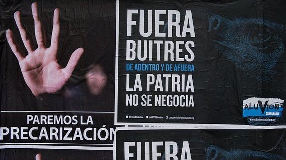 Posters against so-called vulture funds in downtown Buenos Aires on 4 October, 2014.