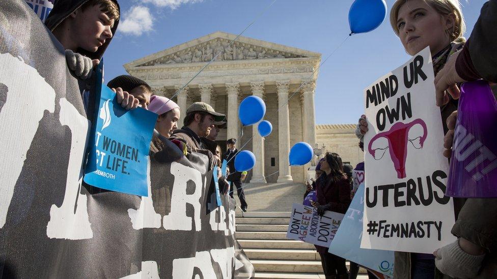 Pro choice and pro life activists at the Supreme Court