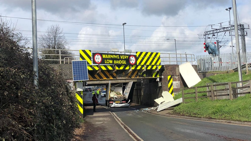 Vehicle stuck under Ely bridge