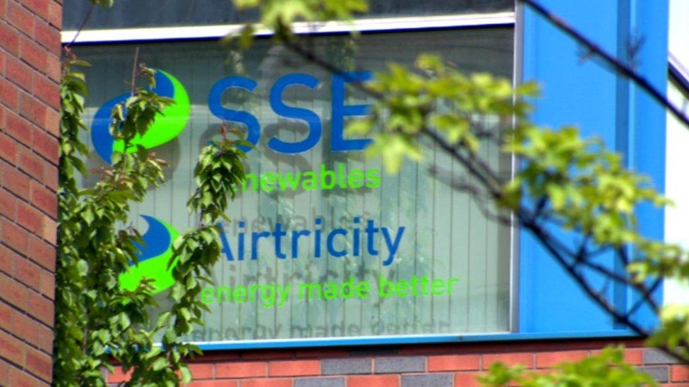 An office window displays the company logo of SSE Airtricity.