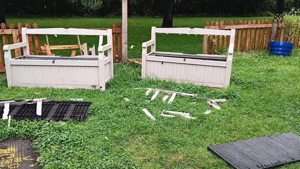 Smashed benches and fences