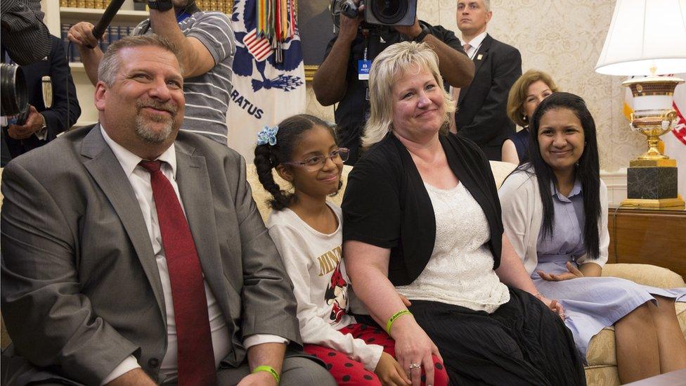 Joshua Holt's father Jason Holt, daughter Marian Leal, mother Laurie Holt and wife Thamara Candelo listen during a meeting with President Donald Trump at The White House on May 26, 2018