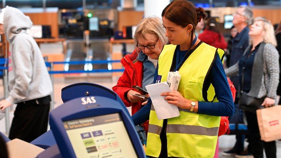 Travellers at Copenhagen Kastrup Airport (2019 file pic)