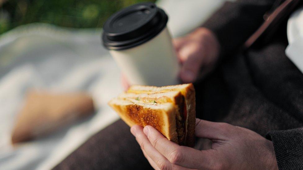 A man eating a sandwich