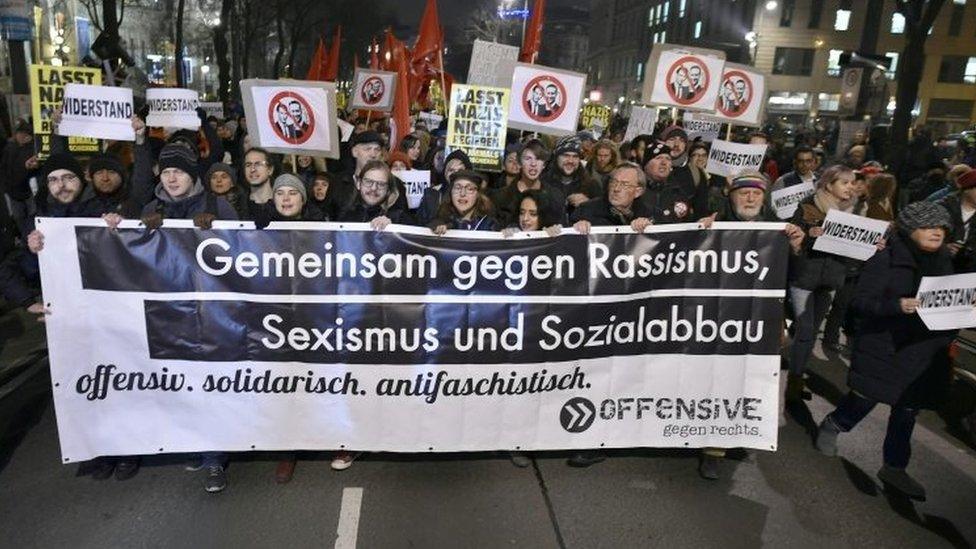 Protesters hold a banner reading "Together against racism, sexism and social cuts" during a demonstration against Vienna's Academics Ball. Photo: 26 January 2018