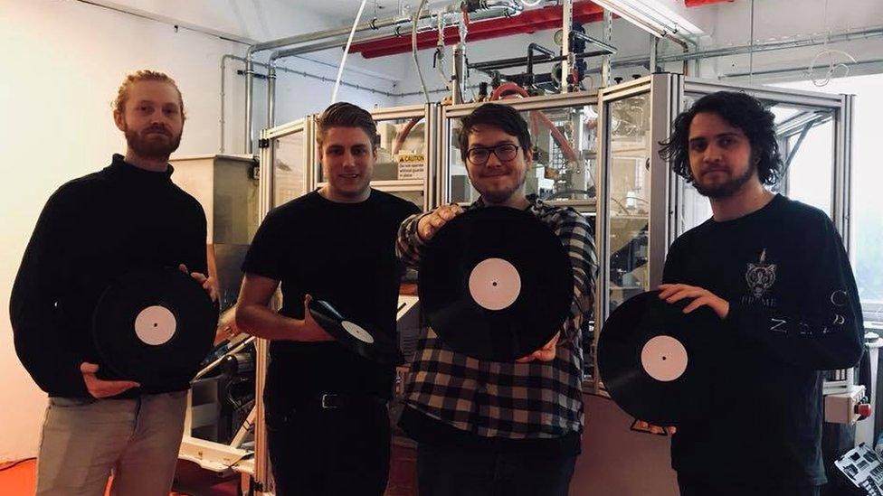 Oscar Trap and his team at his vinyl pressing plant