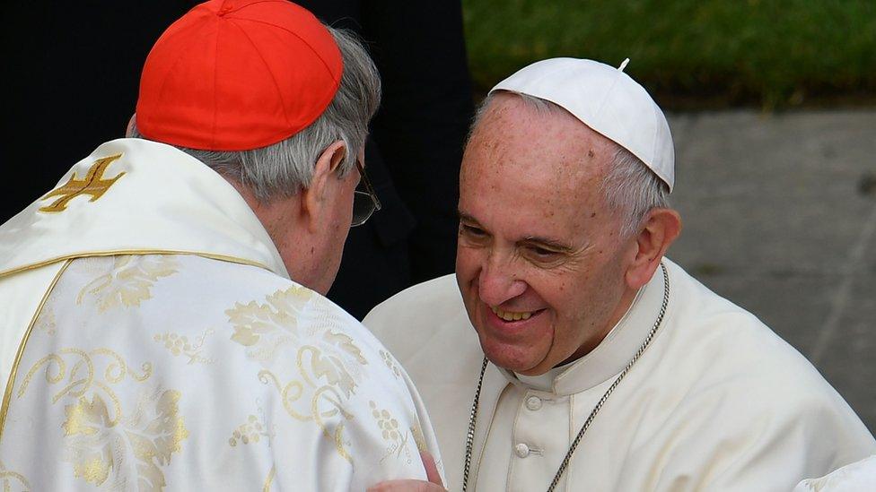 Pope Francis greeting cardinal George Pell of Australia after the celebration of a mass marking the end of the Jubilee of Mercy at the Vatican.