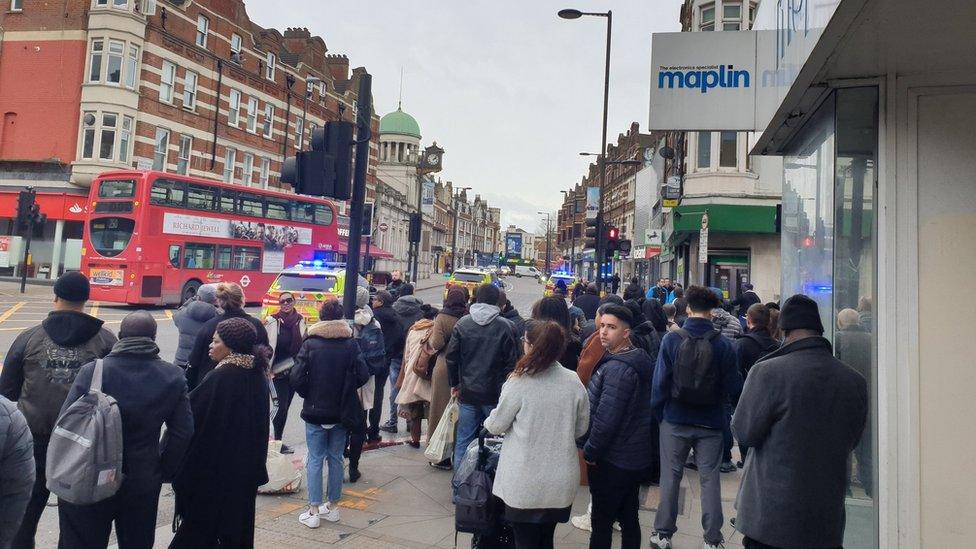 People gather in street