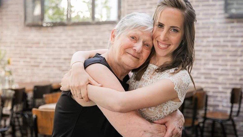 Adva Adar with her grandmother Yafa, 85, who is being held hostage in Gaza